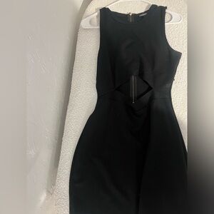 Express black mini dress with cutout in middle, gold zipper down the back